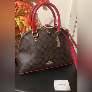 COACH Katy Satchel In Signature Canvas and Red with crossbody strap.